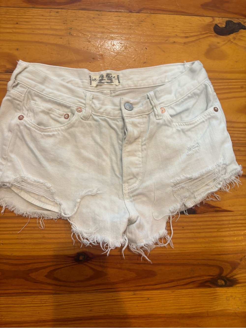We The Free White Distressed Denim Cutoff Shorts